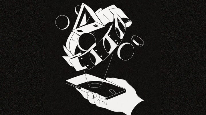 A hand holding a mobile phone; representation of payments graphics
